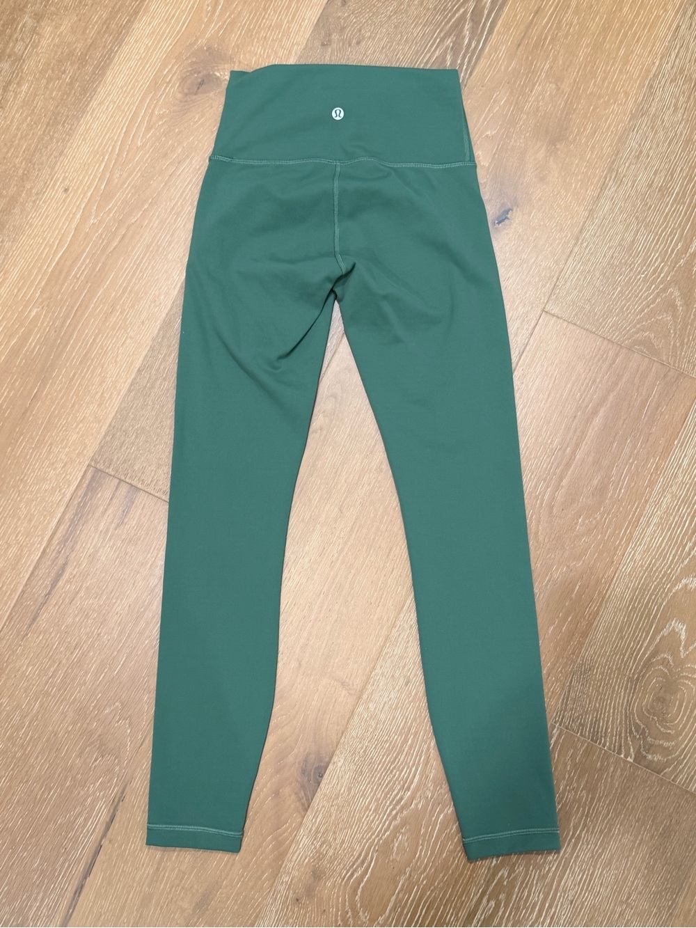 Lululemon Wunder Train High-Rise Tight 25"
Algae Green Size 4 NWOT